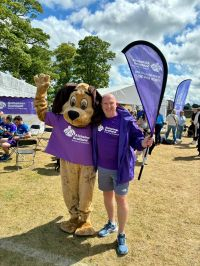 Trustee and mascot buddy the dog